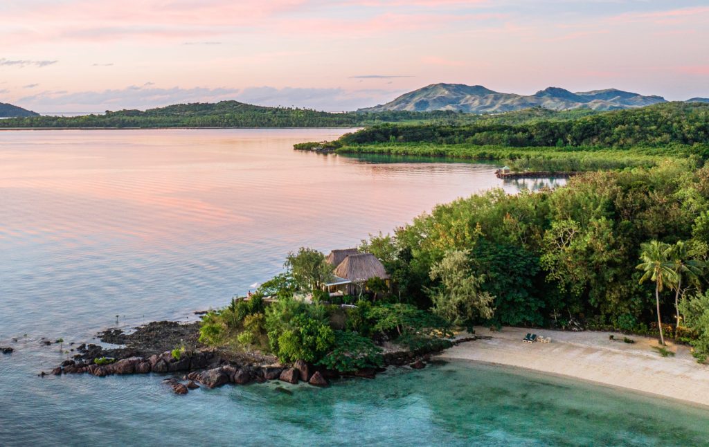 Private island in Fiji with white sand beaches and turquoise waters