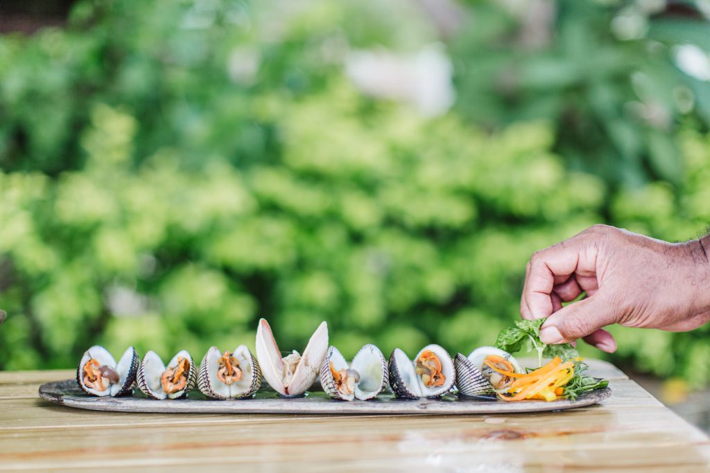 Traditional Fijian dishes featuring fresh seafood, tropical ingredients